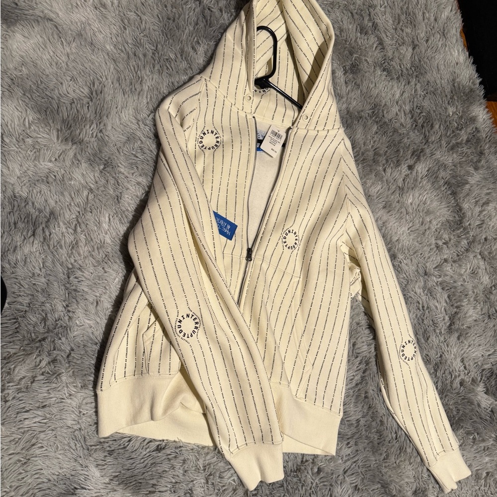 Cream and black zip up hoodie